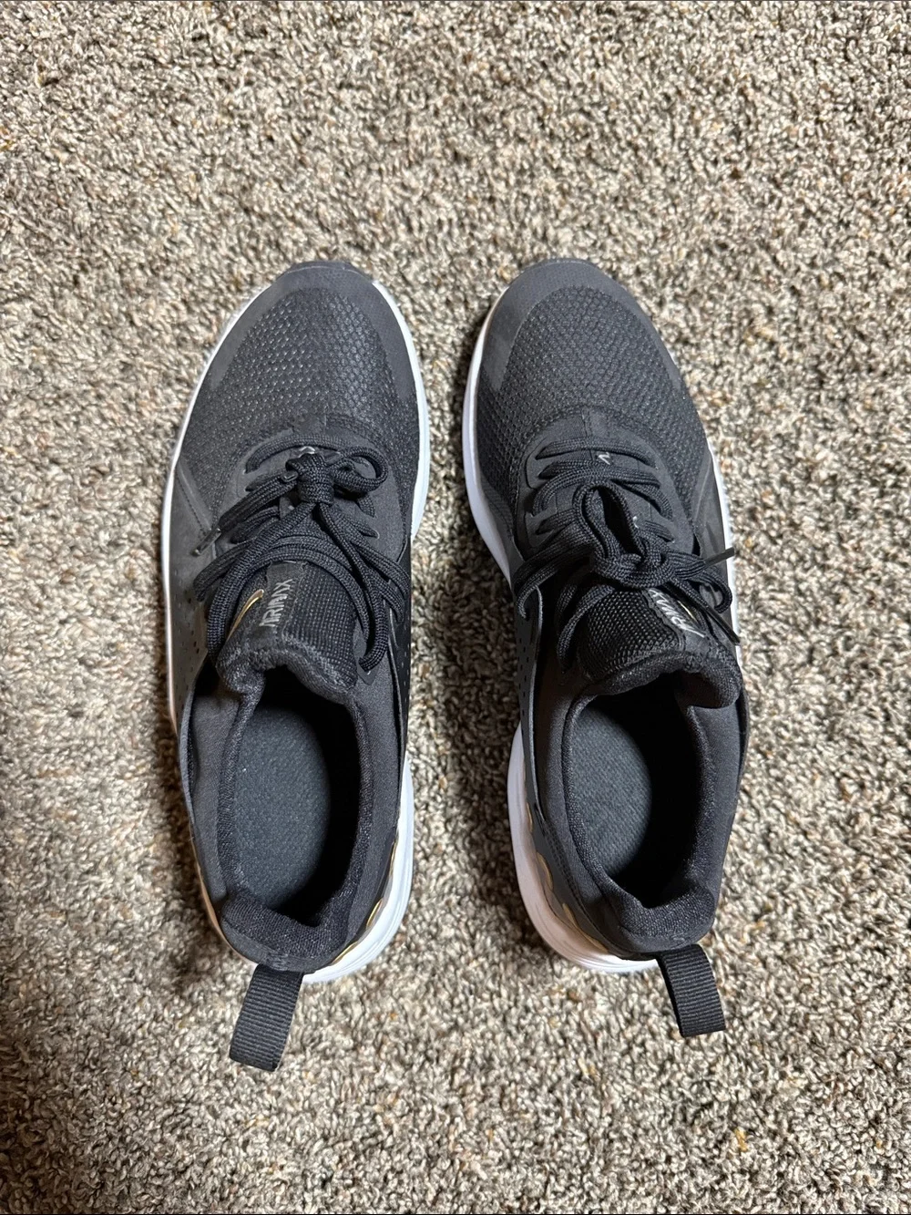 Nike Women’s Black Athletic Sneakers with Gold Accents